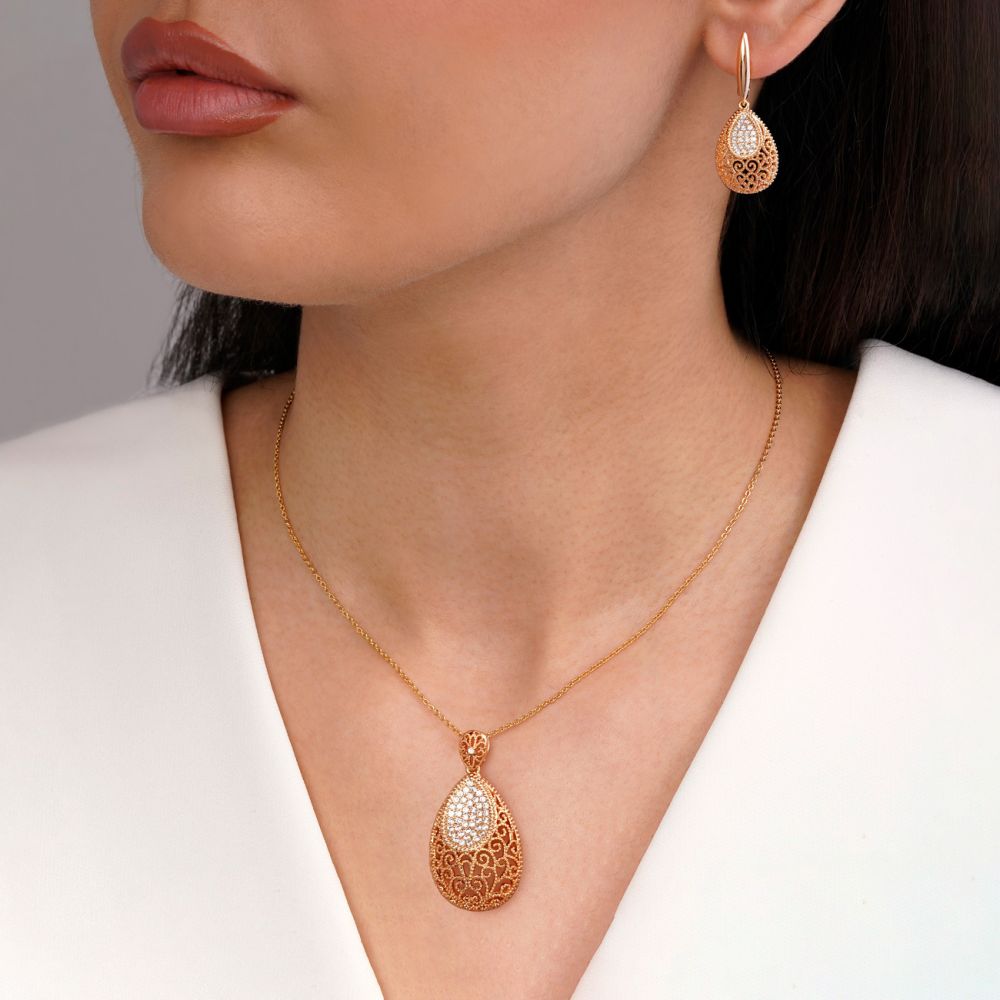 تصویر نیم ست شوپینگ نگین دار طلایی